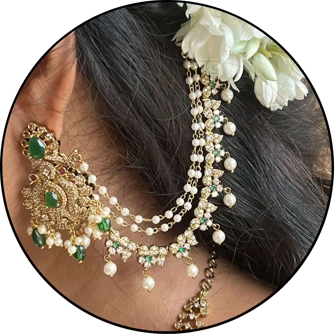 Ear chain on woman ears and attached to hair